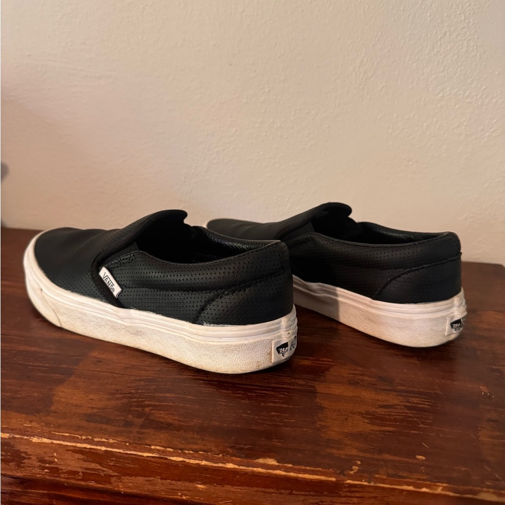 Black leather slip on vans